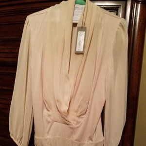 NY & Company cream colored blouse thong bodysuit in size small